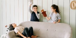 A peaceful living room scene showing children playing together harmoniously.