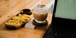 A professional and calm cafe workspace setup for remote productivity.