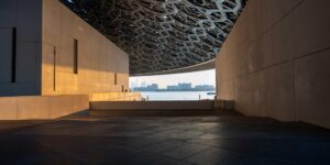 A quiet, sunlit museum gallery representing the benefits of off-peak visits.