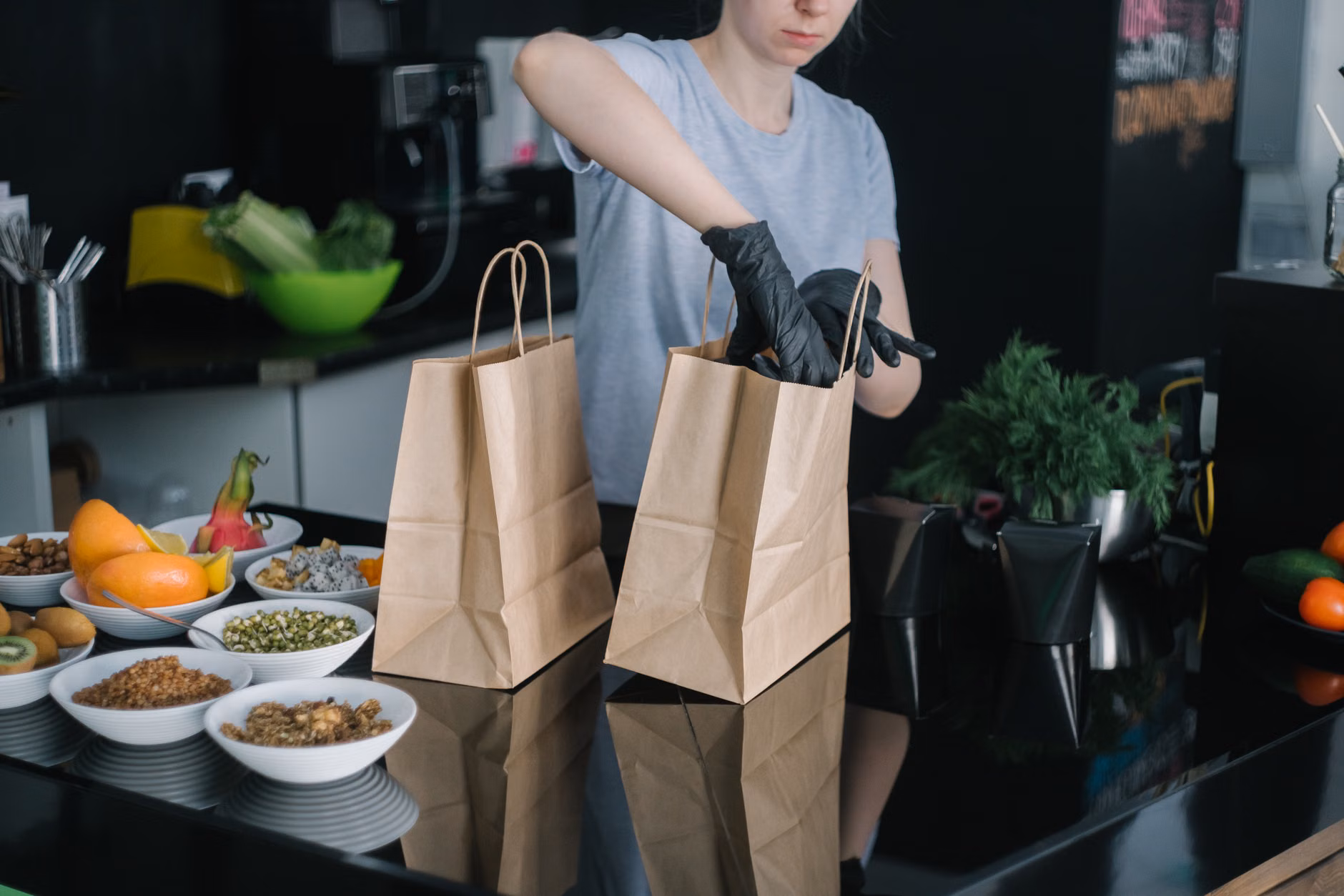 A parent preparing simple meal kits to streamline the upcoming busy week.