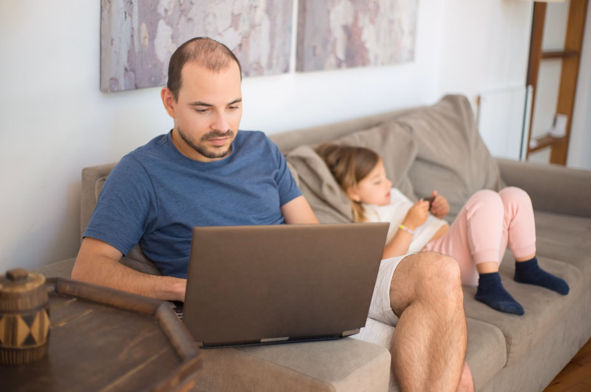 A parent managing household digital security from the comfort of their home.