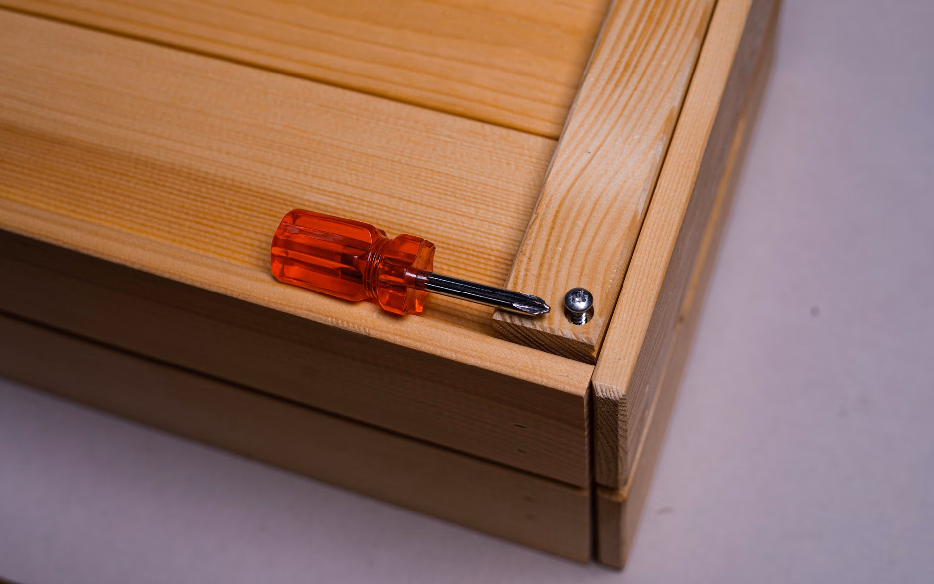 Close-up detail of high-quality wooden crib joinery.