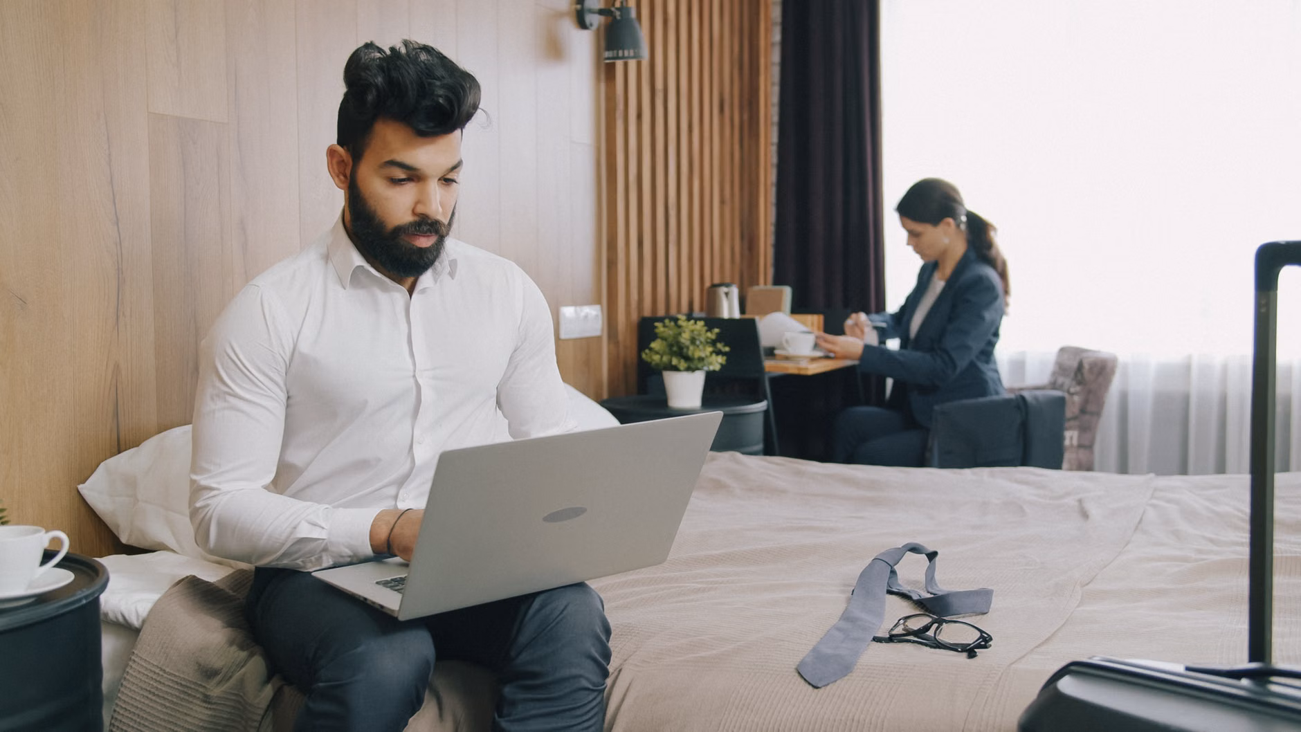 A quiet hotel room setup for remote work or travel planning.
