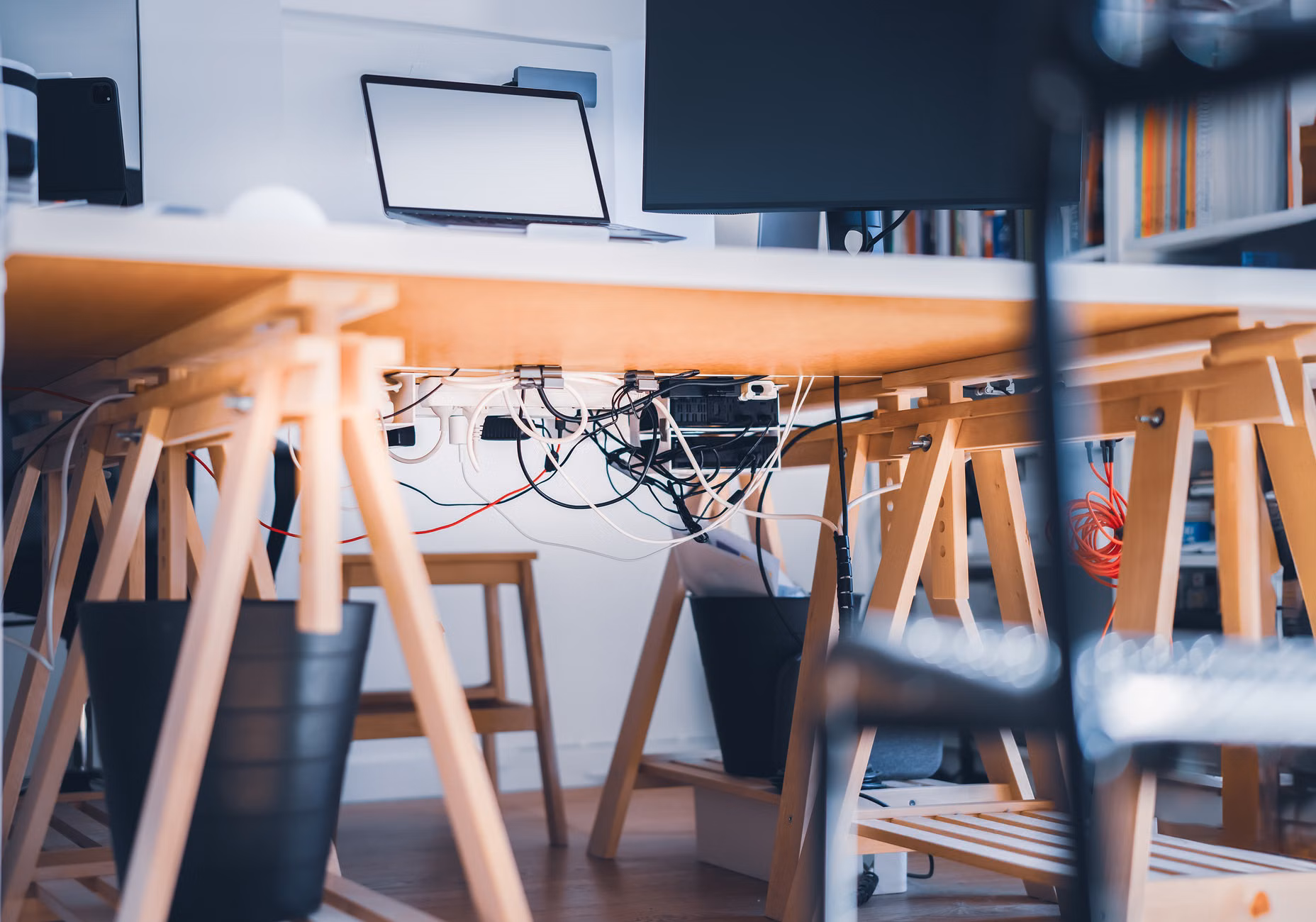 Effective cable management on a teen study desk
