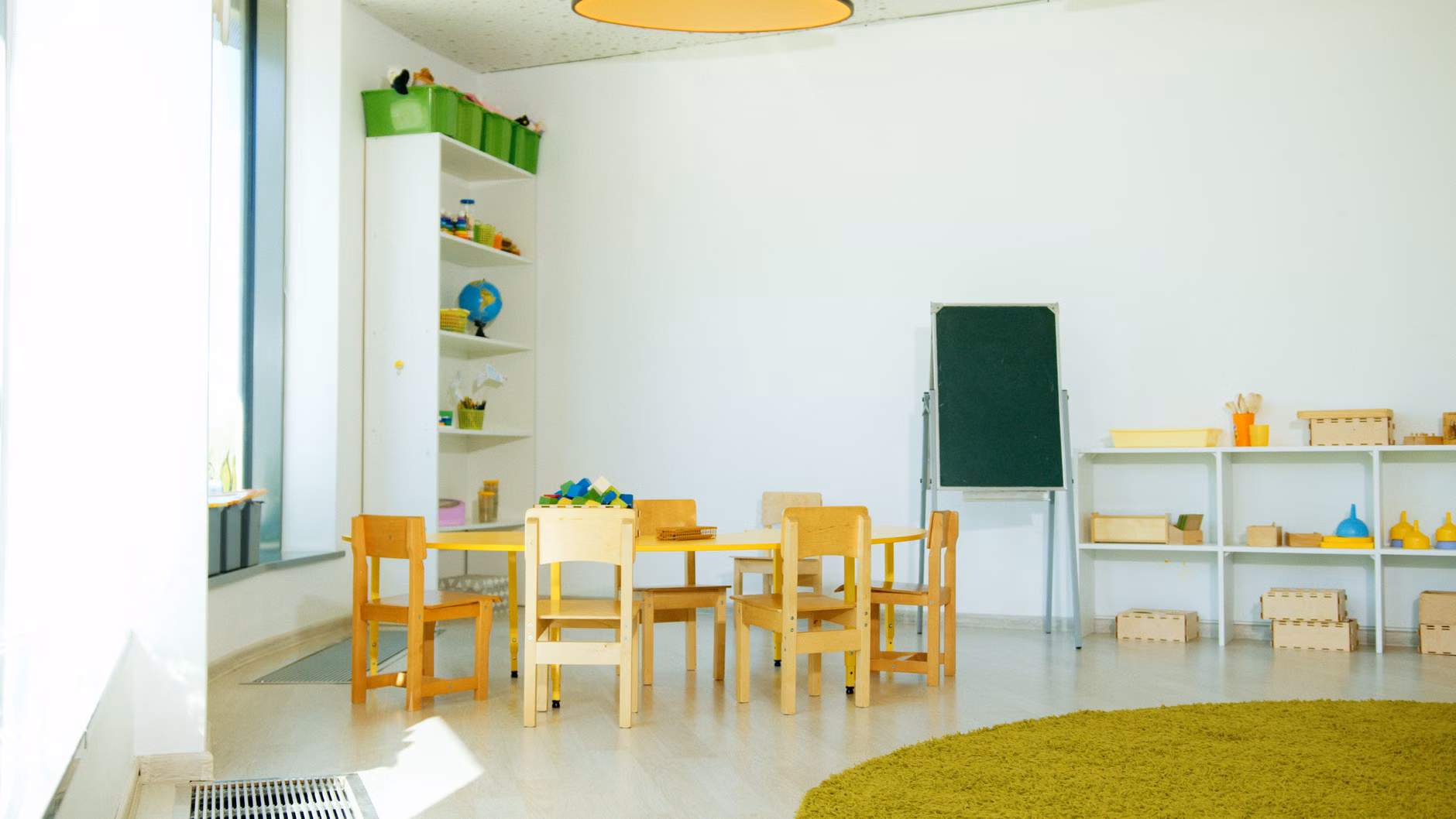 A clean and organized indoor play area for children within a community hub.