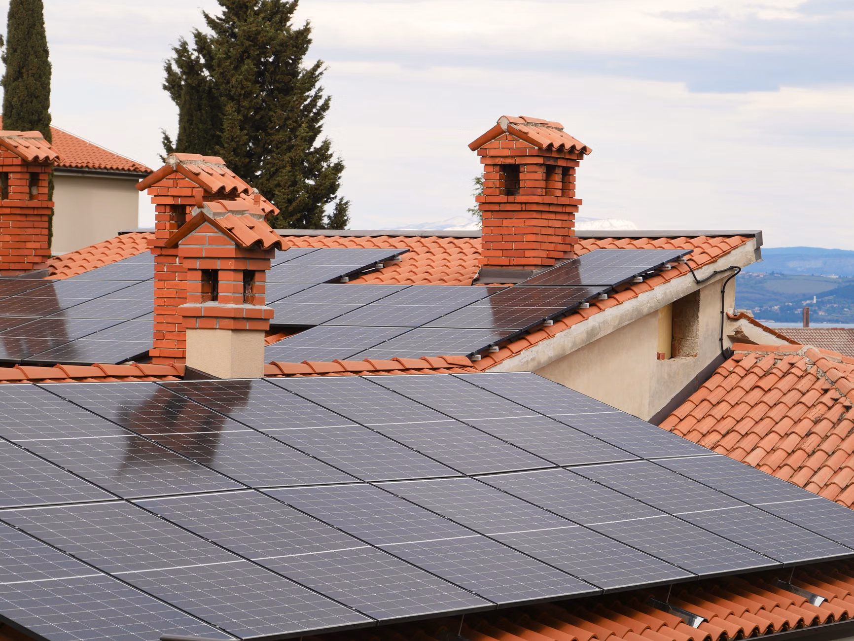 Solar panels installed on a residential roof to manage energy independence.