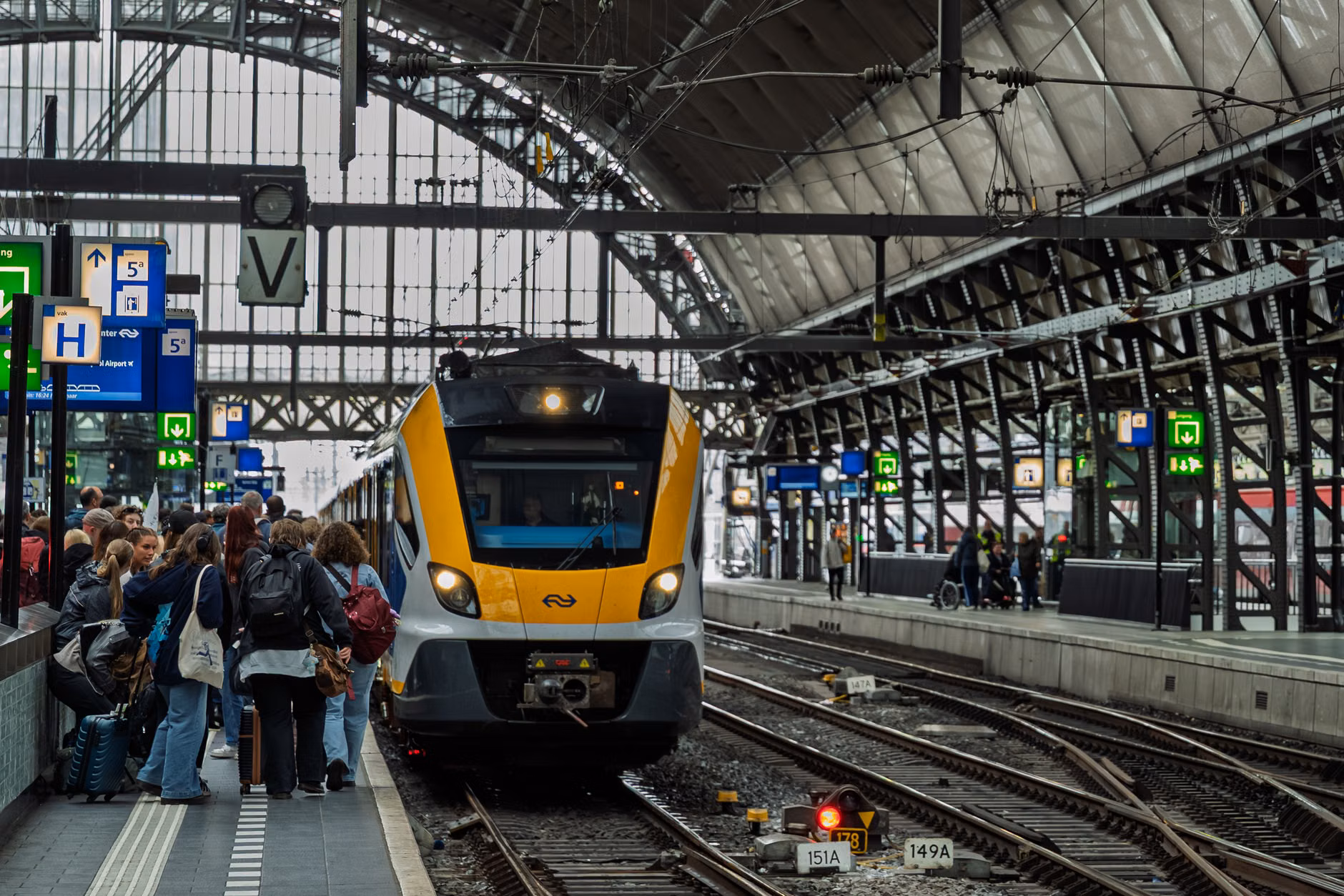 A family arriving in a city center via train station.