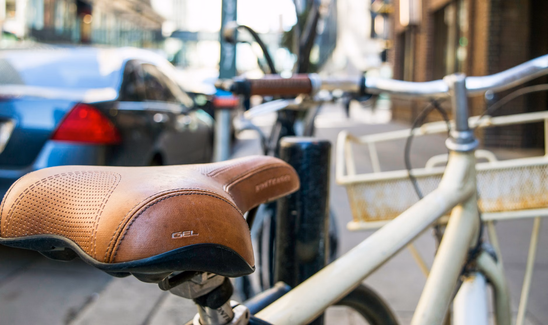 Organizing gear into a bike basket for a commute.
