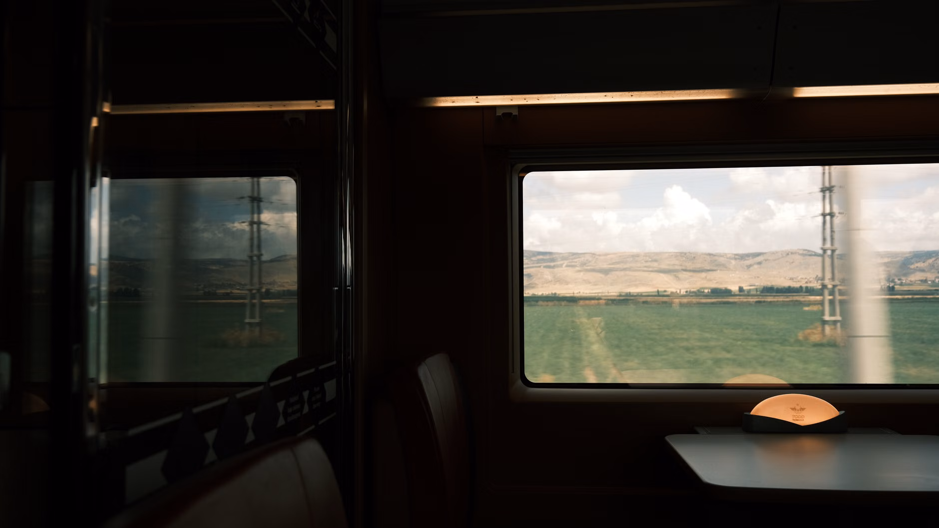 View from a train window during a regional travel journey.