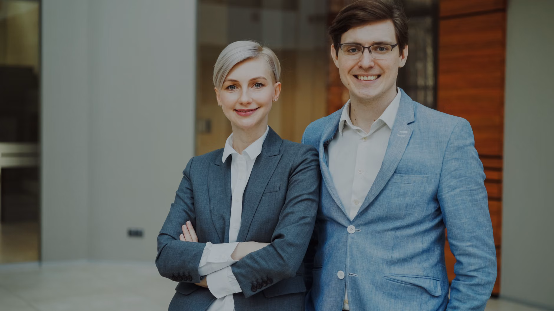 Professionals in their 30s and 40s networking in a modern, alcohol-free office environment.