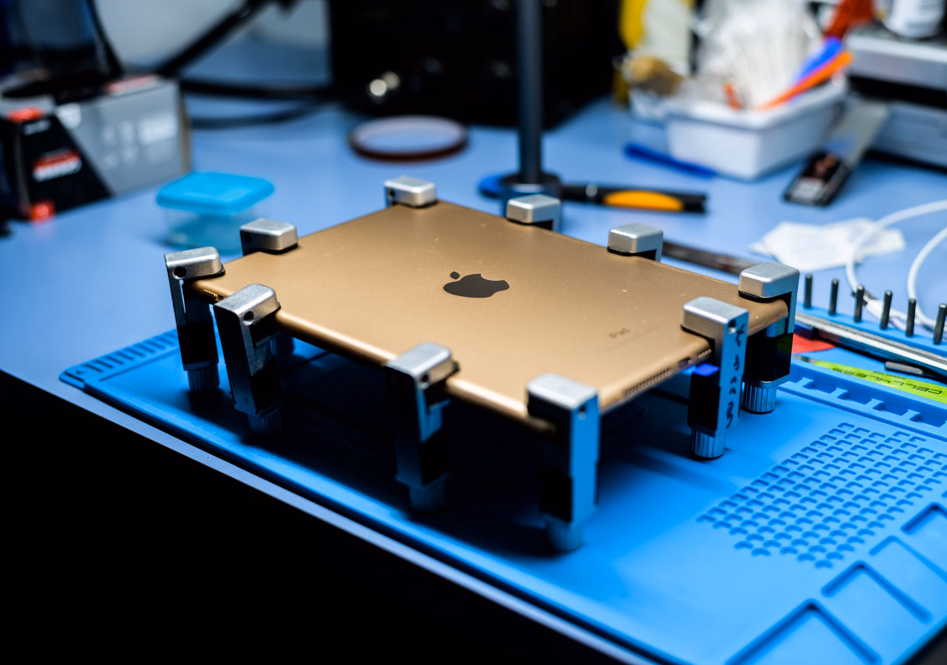 Essential electronic repair tools arranged on a desk
