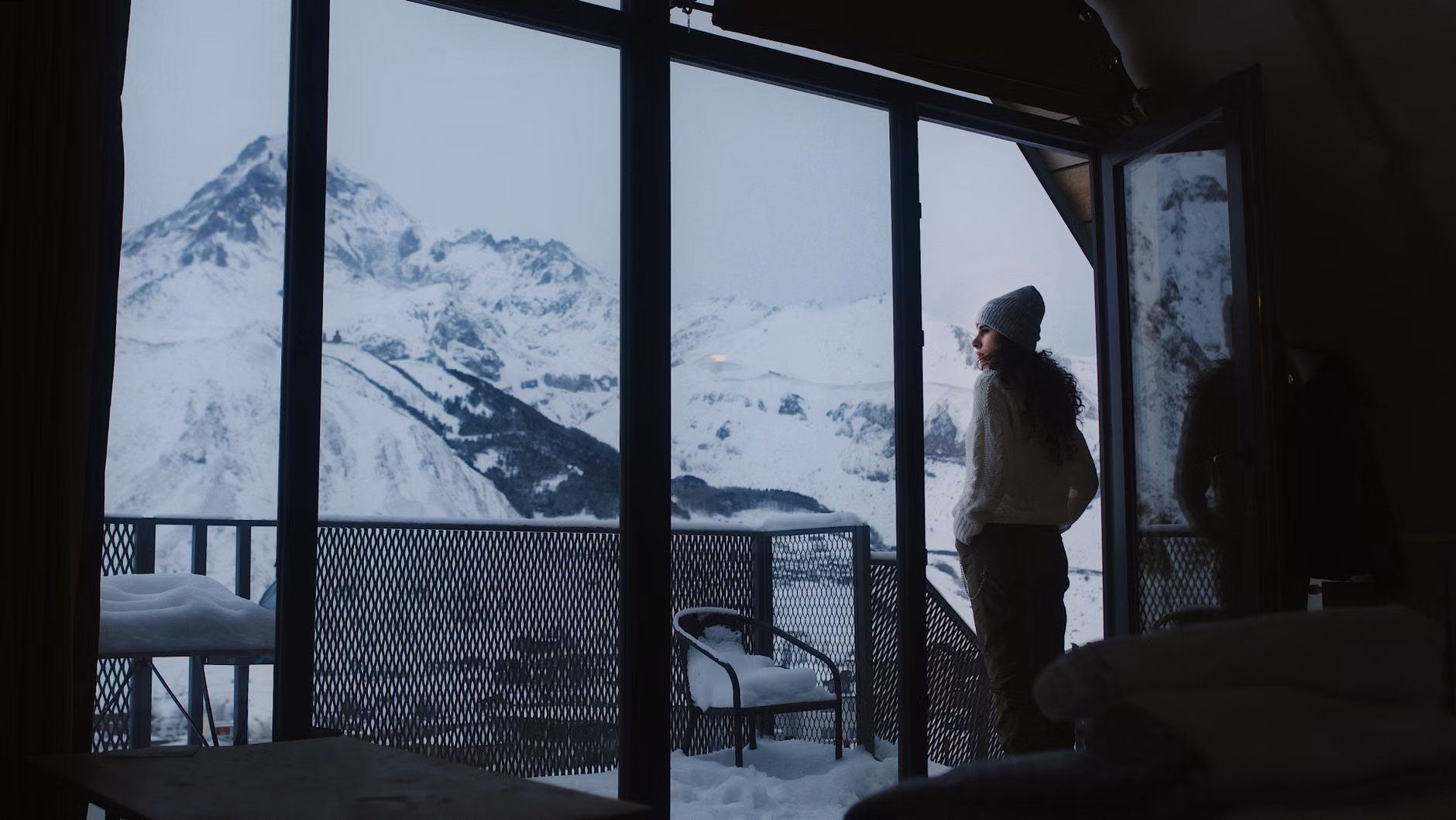 A curated packing list for a quiet mountain retreat including a journal and hiking gear.