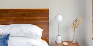 A minimalist bedside table setup promoting peaceful sleep.