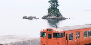 A scenic train journey along a stunning coastal route.