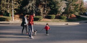 A family planning a neighborhood history walk together.