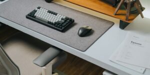A clean, modern desk setup featuring various pieces of technology, representing smart refurbished hardware shopping.