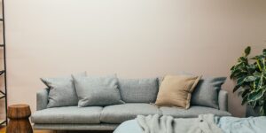 A serene, minimalist living room representing a calm home environment.