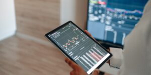 A digital energy dashboard displayed on a tablet in a modern home