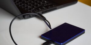 A modern home network storage device on a desk.