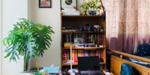 A cozy, sunlit space set up for a productive and intellectual book club meeting.