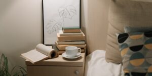 A cozy, modern home setting with books and coffee, representing a relaxed book club environment.