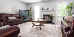 A cozy, sunlit living room prepared for a relaxing family staycation.