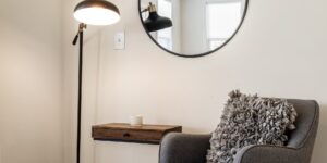 A serene and minimalist small living room corner designed for slow living.