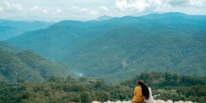 A family enjoying a quiet, scenic view during a vacation.