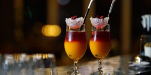 A stylish, alcohol-free dinner party table setup with craft mocktails.