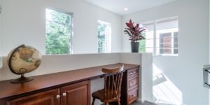 A bright, modern family study room featuring a modular desk setup