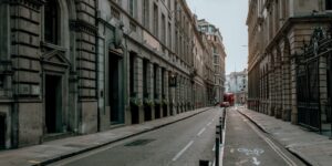 A serene, empty side street in a historic city, perfect for quiet-tourism.