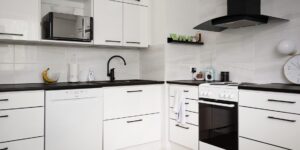 A bright, organized, and minimalist kitchen setup designed for high efficiency.