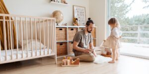 A serene, minimalist living space reflecting the post-growth parenting philosophy.