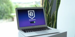 A clean, modern workspace featuring a laptop with a secure browser setup.