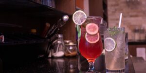 Sophisticated non-alcoholic cocktails on a kitchen counter.