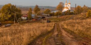 A peaceful rural village path at golden hour