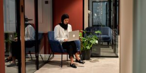 A professional working in a modern remote workspace.