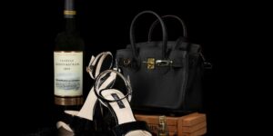 A sophisticated lifestyle scene featuring a pre-owned luxury item on a desk.