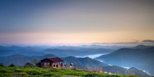 A serene mountain cabin retreat at sunrise, perfect for a quiet family getaway.