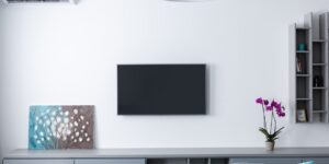 A sleek air purifier in a modern living room during a hazy wildfire day.