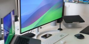 A modern home office setup with smart energy monitoring tools.