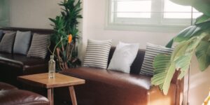 A minimalist, sunlit living room representing sustainable urban parenting.