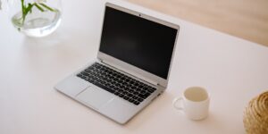 Minimalist home office desk with secure digital technology.