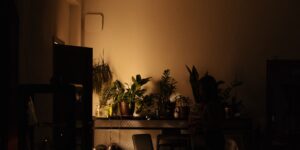A peaceful, dimly lit nursery with warm smart lighting.