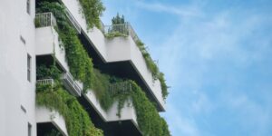 A modern balcony garden featuring a smart irrigation system setup.