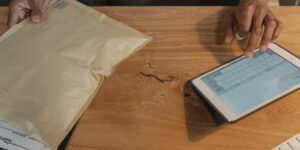 A modern desk with a logistics map on a tablet representing 2026 supply chain trends
