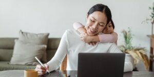 A professional parent taking a mindful break from work.