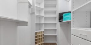 A clean, organized luxury closet representing the second-hand fashion movement.