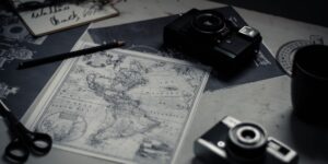 A workspace with a world map and family history tools for an ancestral project.