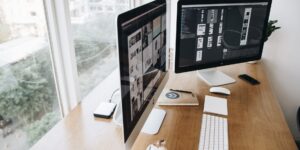 A clean, modern workspace representing the organization of a dual-career household.